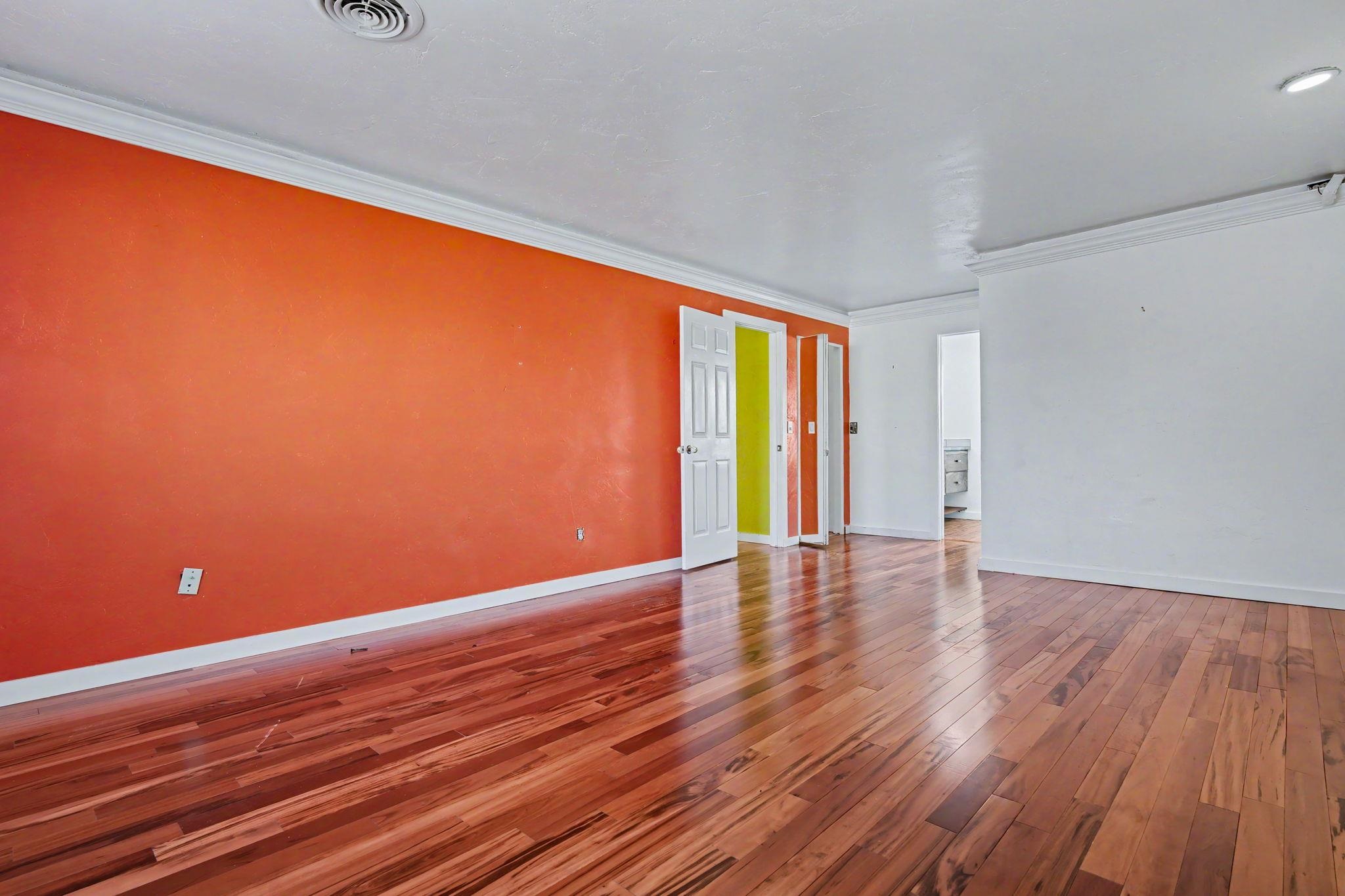 2700 G Road, Unit 12F Grand Junction, CO 81506 - Photo 12 of 24 a view of room with window and wooden floor