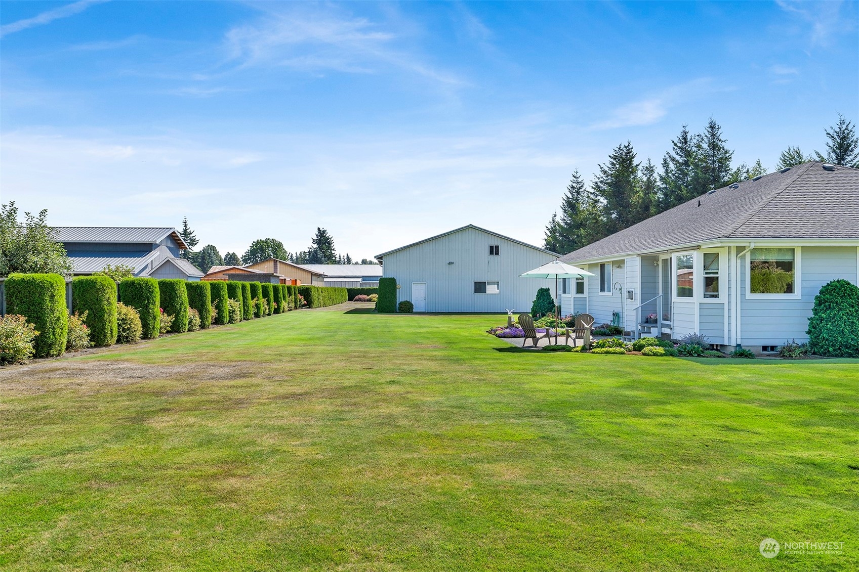 343 West Pole Road Lynden, WA 98264 - Photo 32 of 40 a front view of house with yard outdoor seating and green space