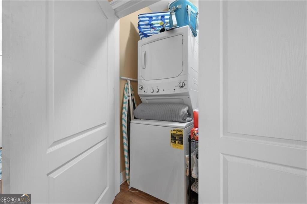 7272 Shellman Bluff Road Northeast, Unit 21 Townsend, GA 31331 - Photo 25 of 33 a utility room with dryer and washer
