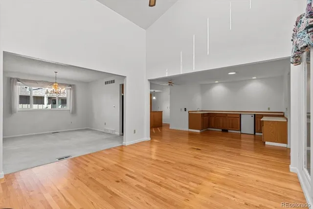 a kitchen with granite countertop a sink and cabinets