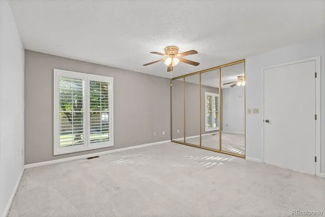 a bathroom with a sink vanity and a mirror