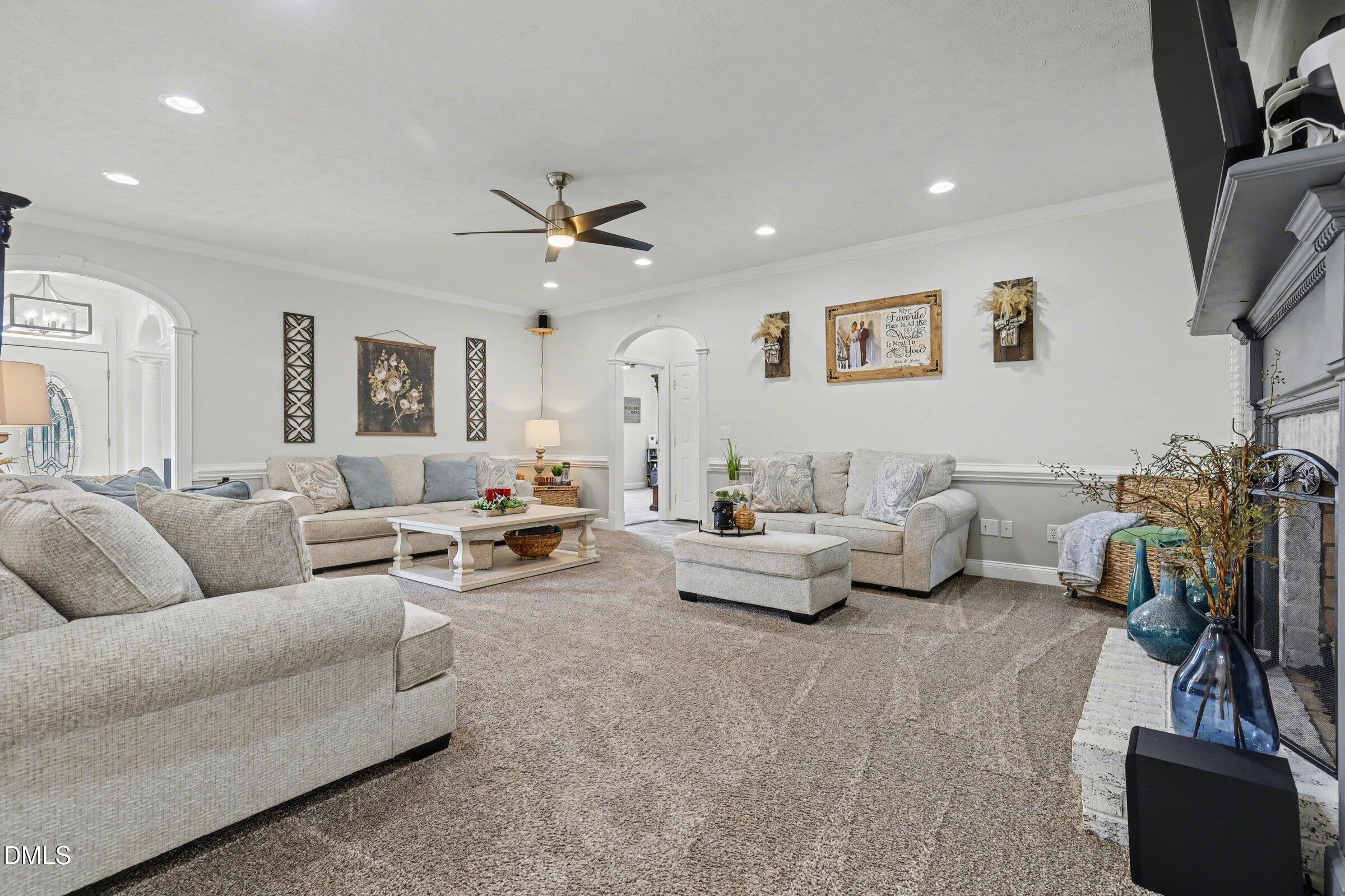 430 Fred Hall Road Stedman, NC 28391 - Photo 6 of 63 a living room with furniture and a flat screen tv
