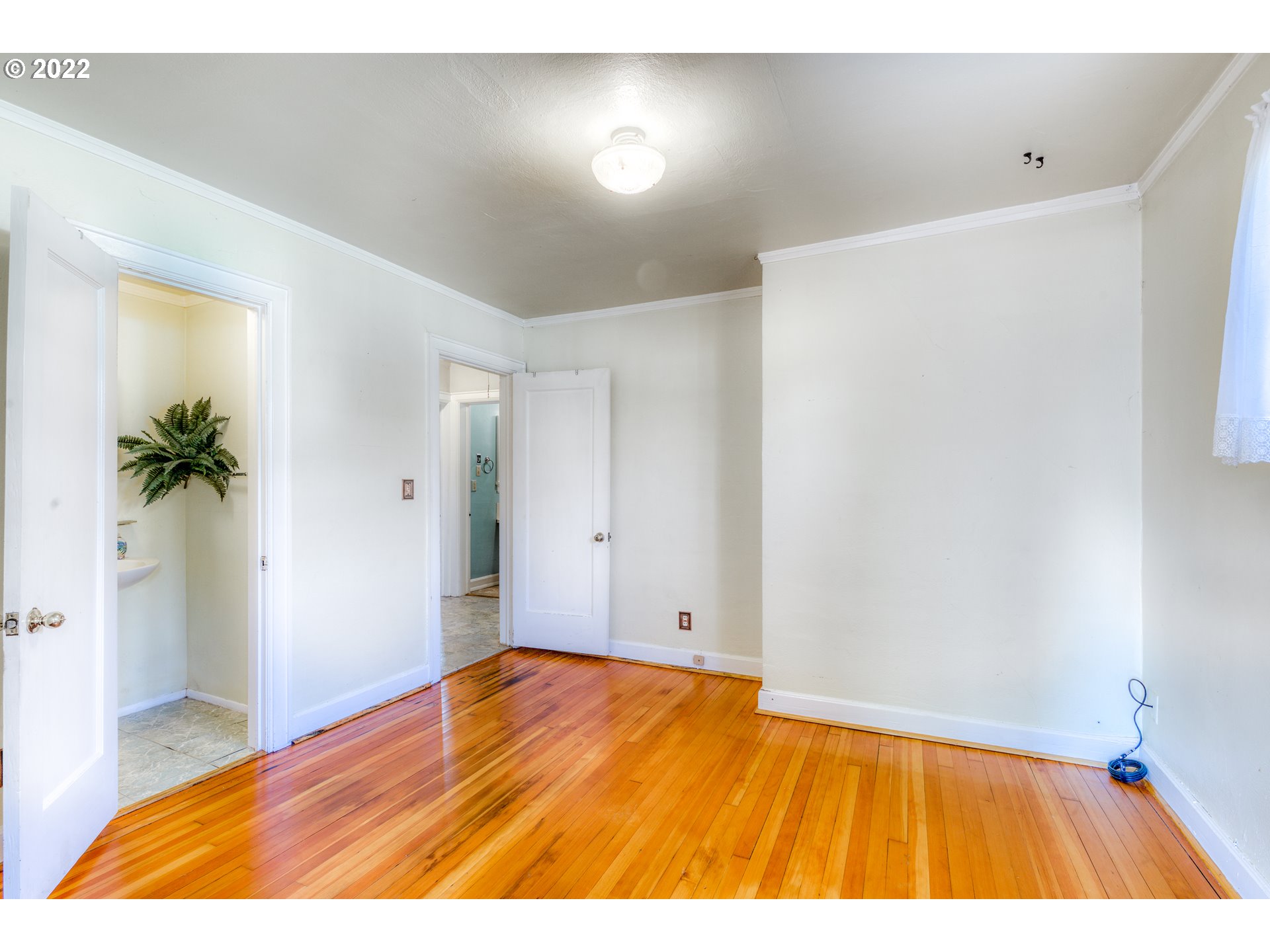924 Chambers Street Eugene, OR 97402 - Photo 15 of 27 a view of an empty room with wooden floor