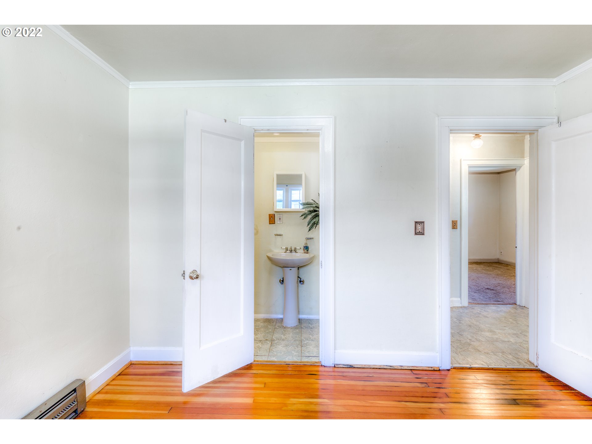 924 Chambers Street Eugene, OR 97402 - Photo 17 of 27 a view of a room with wooden floor and chair