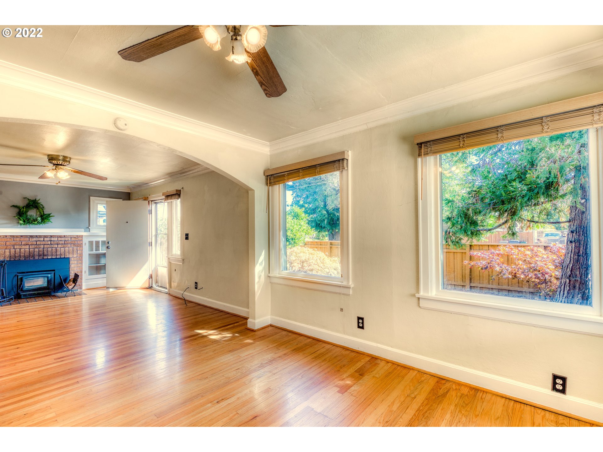 924 Chambers Street Eugene, OR 97402 - Photo 8 of 27 a view of an empty room with window and wooden floor