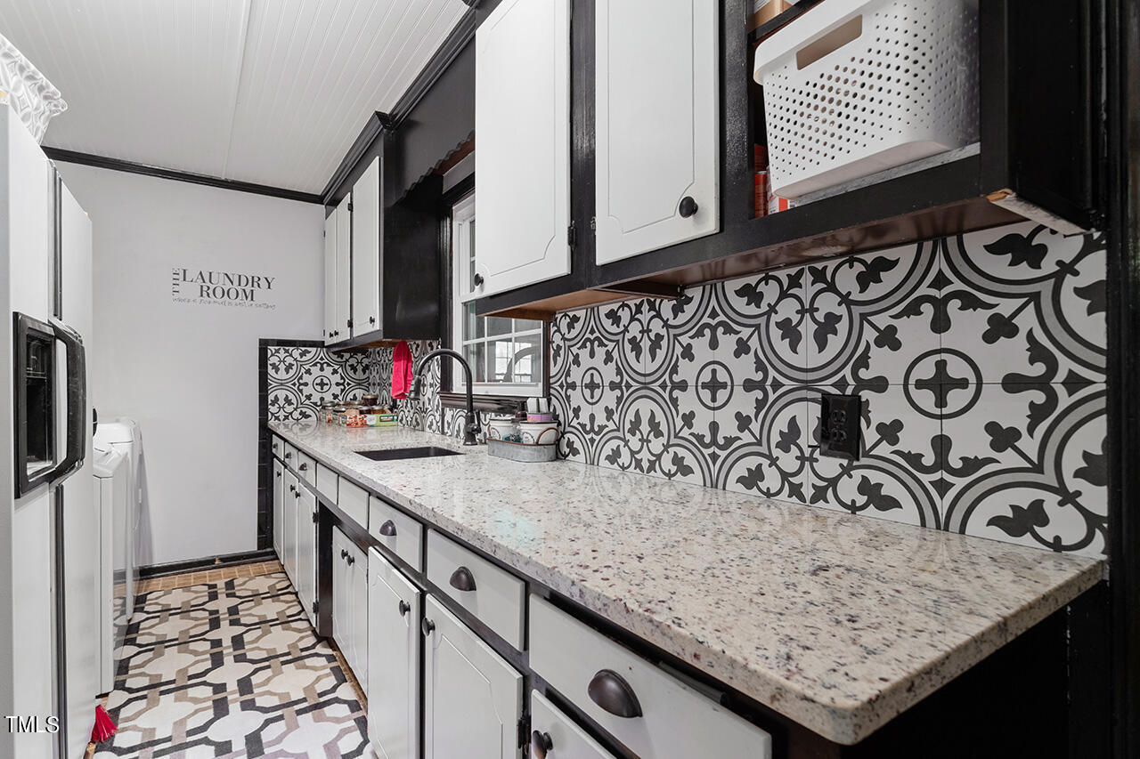 1660 Benson Road Angier, NC 27501 - Photo 18 of 32 Beautifully updated laundry room! Appliances convey!