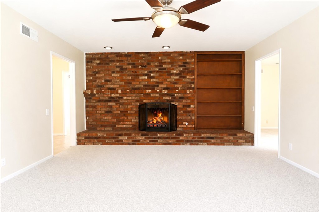 2145 Fairview Avenue Riverside, CA 92506 - Photo 8 of 35 a living room with fireplace