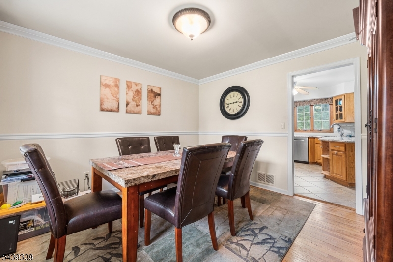 1 Oak Grove Road Flemington, NJ 08822 - Photo 8 of 29 a view of a dining room with furniture and a table