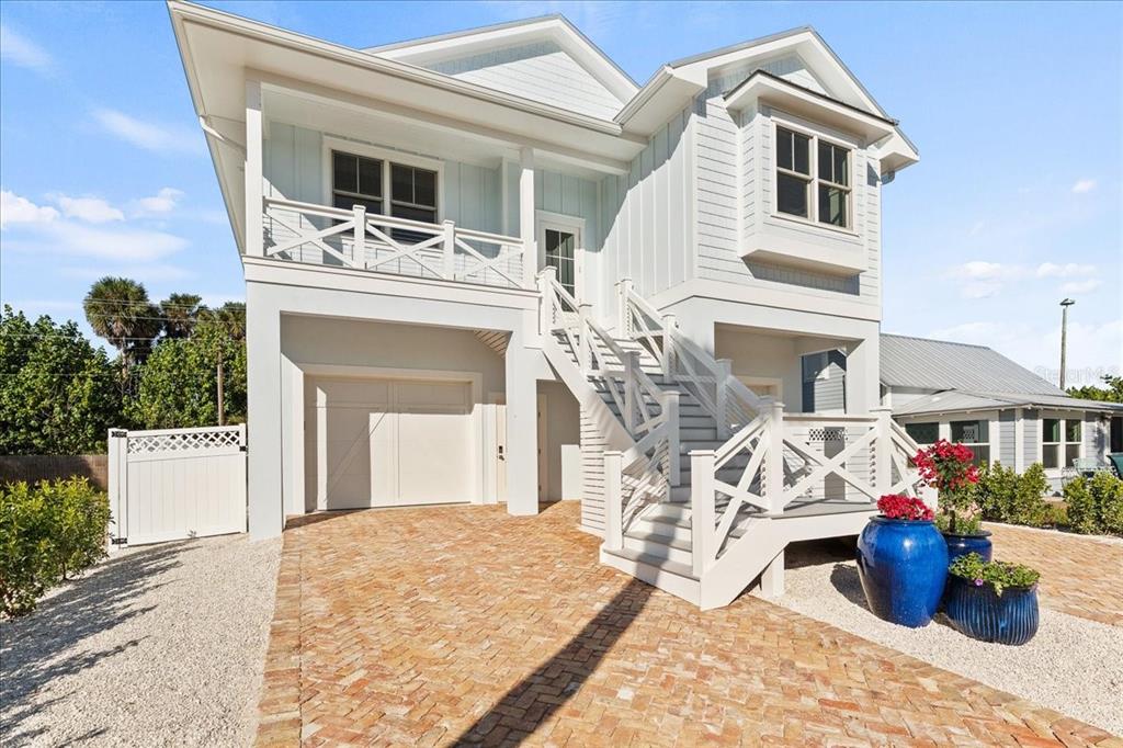 847 Belcher Road Boca Grande, FL 33921 - Photo 2 of 74 a view of a house with a porch