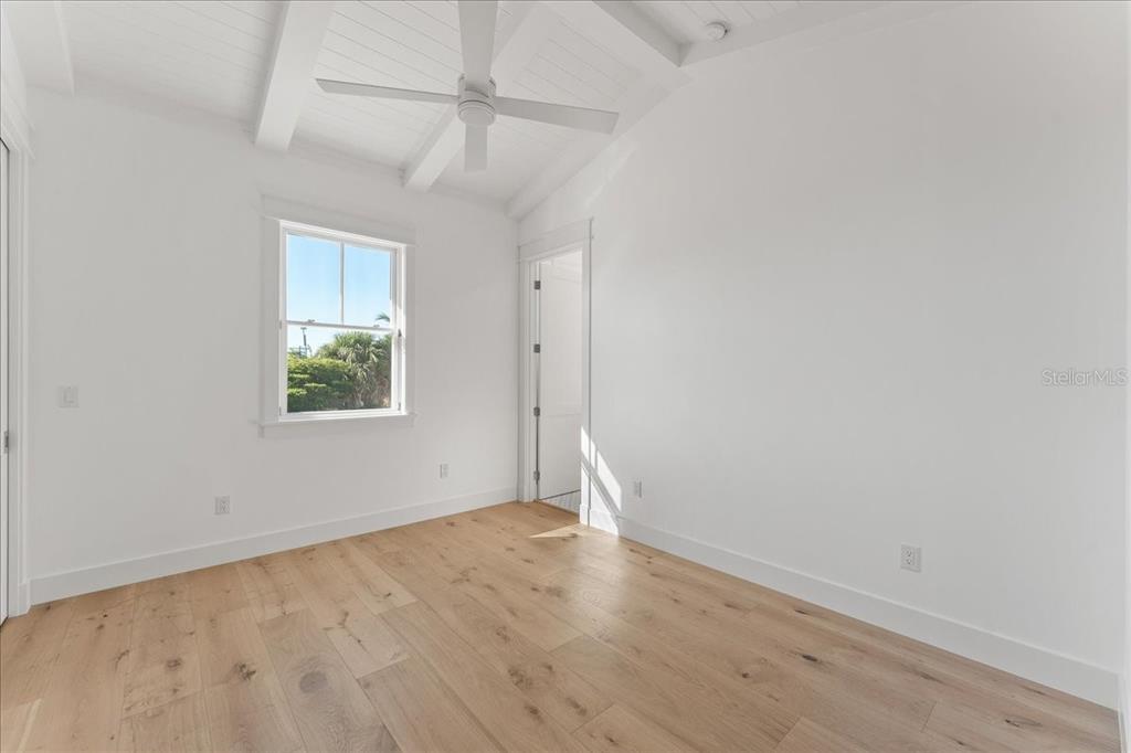 847 Belcher Road Boca Grande, FL 33921 - Photo 40 of 74 an empty room with a empty space and a window