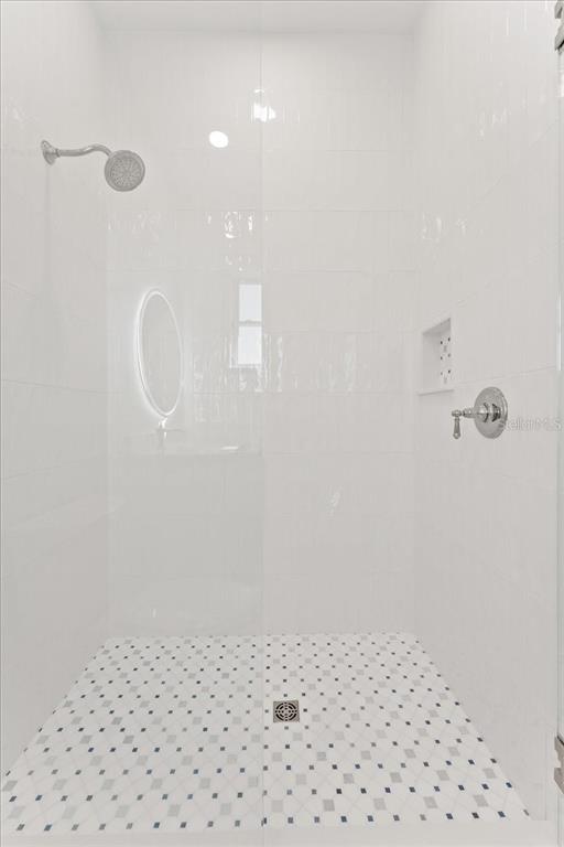 847 Belcher Road Boca Grande, FL 33921 - Photo 43 of 74 a bathroom with a shower