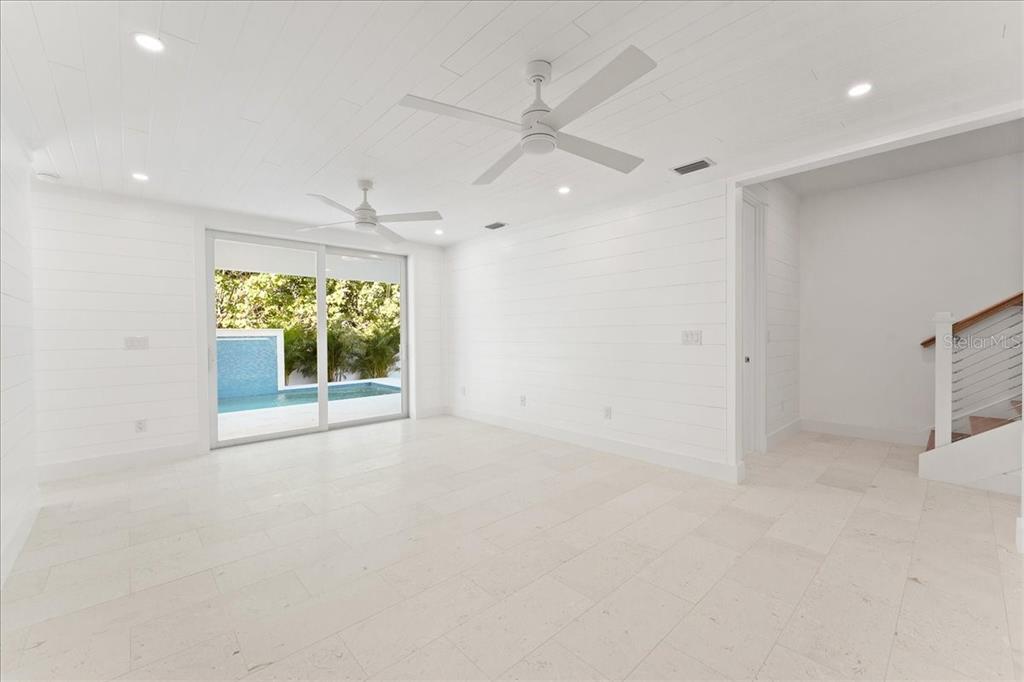 847 Belcher Road Boca Grande, FL 33921 - Photo 51 of 74 an empty room with a empty space and a large window