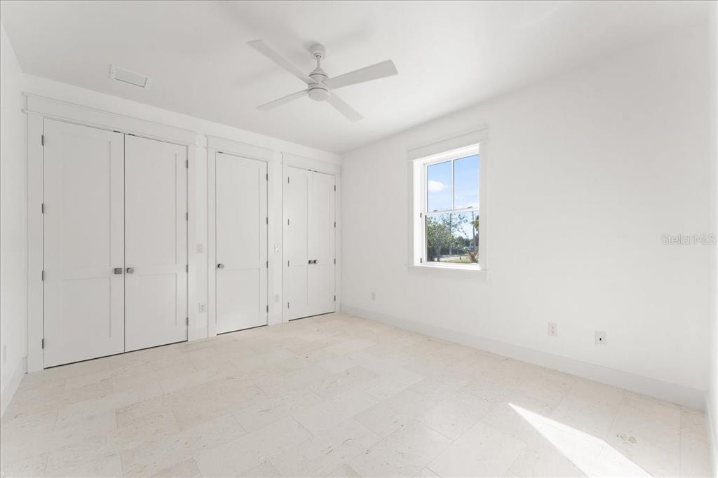 847 Belcher Road Boca Grande, FL 33921 - Photo 54 of 74 a view of an empty room with a window