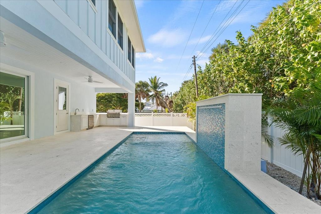 847 Belcher Road Boca Grande, FL 33921 - Photo 59 of 74 a view of backyard with plants and outdoor seating