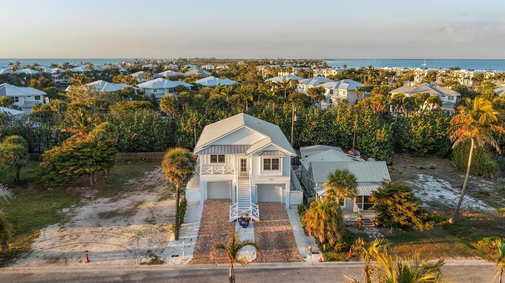 847 Belcher Road Boca Grande, FL 33921 - Photo 90 of 99 an aerial view of a house