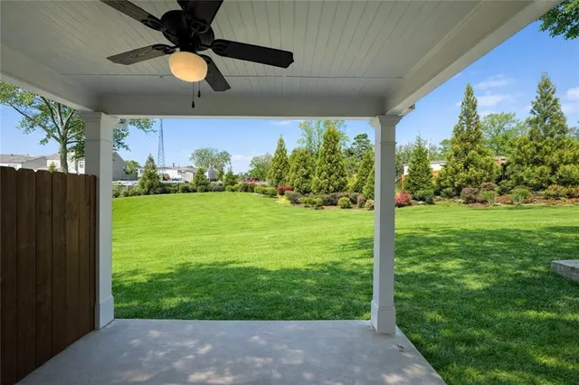 a view of a porch and garden