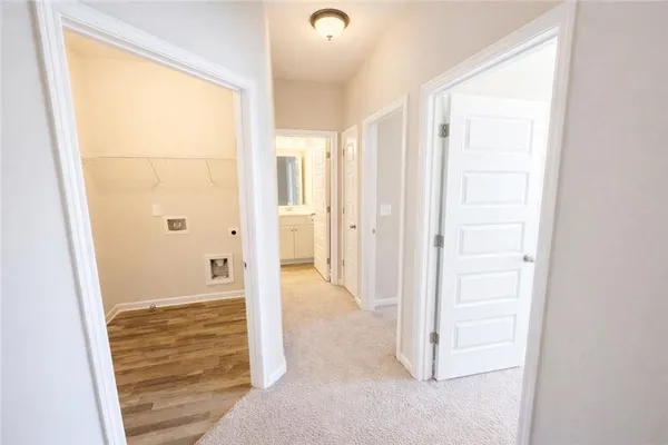 a view of a bathroom with a glass door