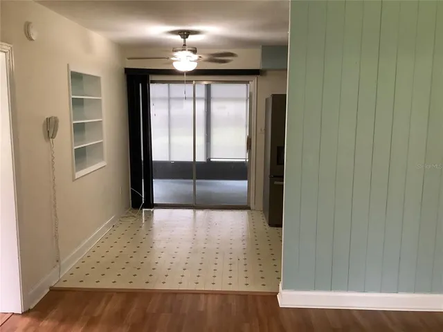 a view of empty room with windows