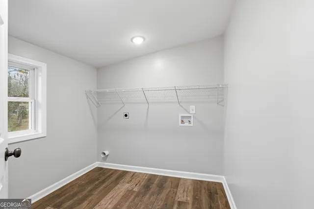 a view of a small space with racks on the wall