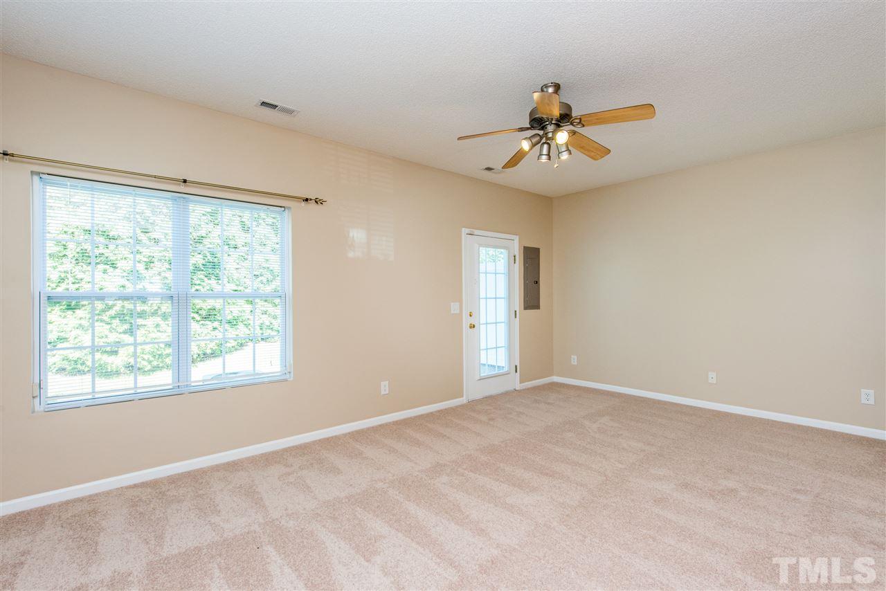 106 Eldon Lane Apex, NC 27502 - Photo 11 of 22 a view of an empty room with a window