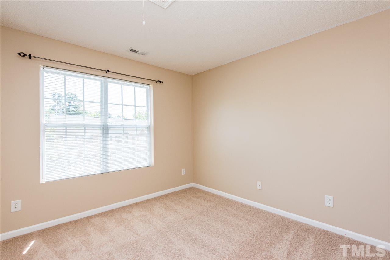 106 Eldon Lane Apex, NC 27502 - Photo 16 of 22 an empty room with a window