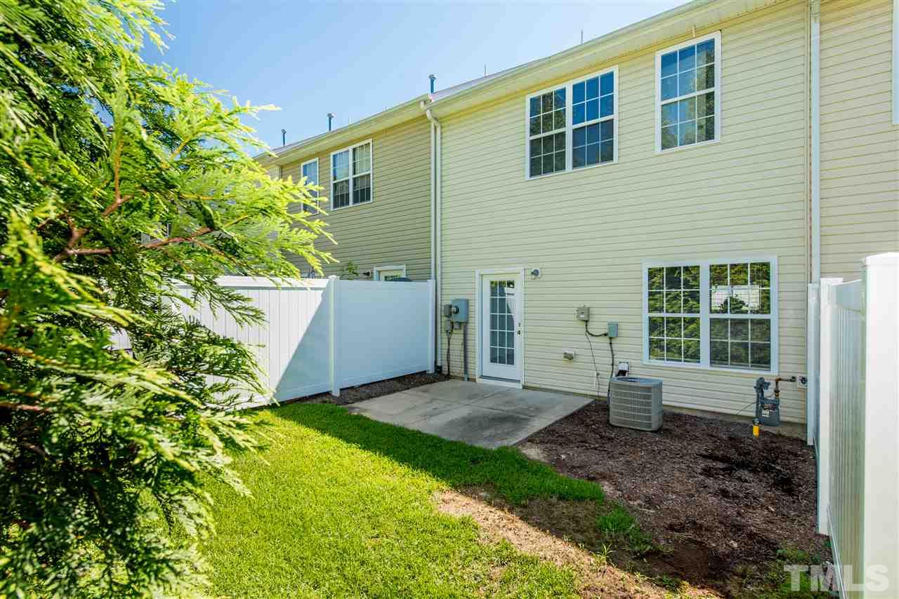 106 Eldon Lane Apex, NC 27502 - Photo 20 of 22 a view of a house with backyard and garden