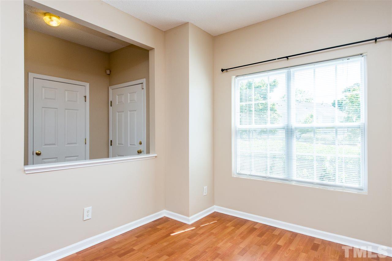 106 Eldon Lane Apex, NC 27502 - Photo 6 of 22 a view of a room that has a window in it
