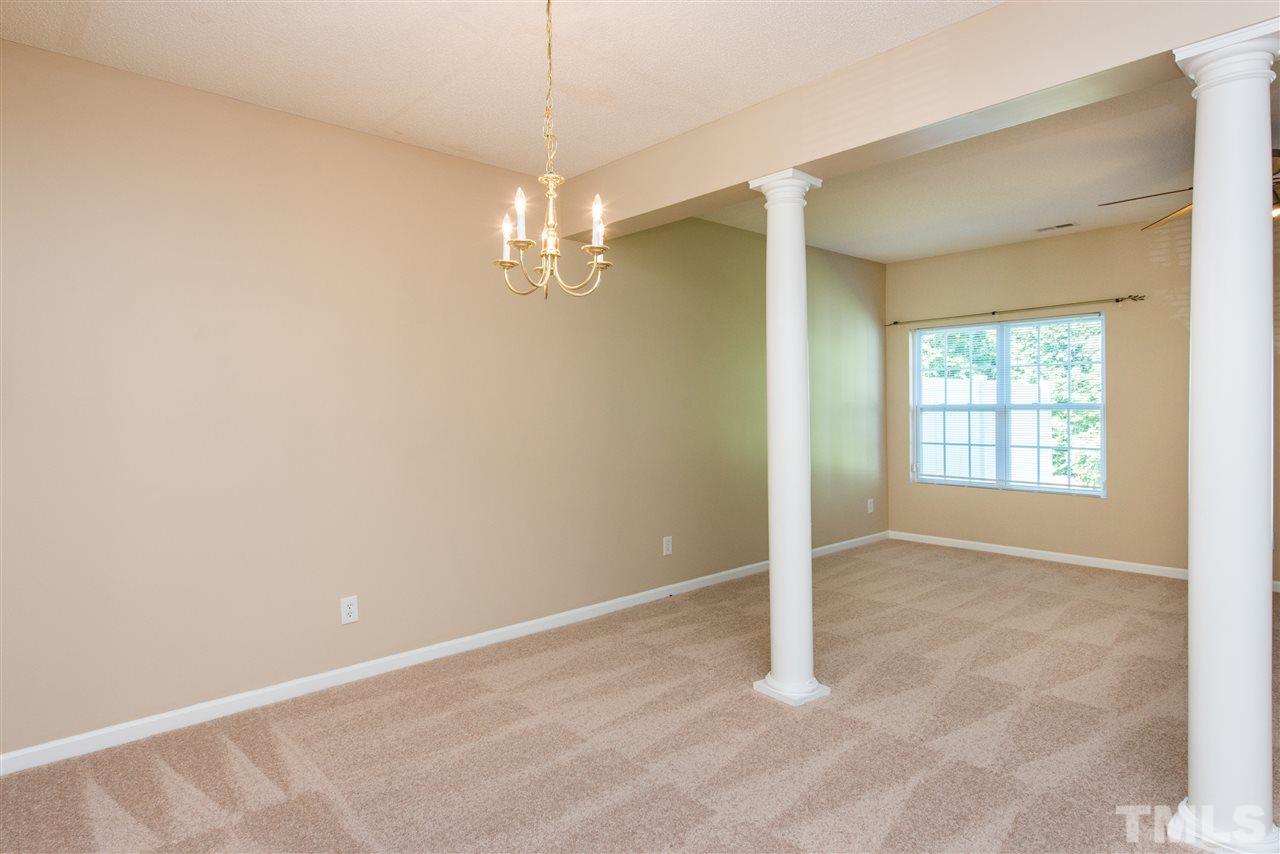 106 Eldon Lane Apex, NC 27502 - Photo 9 of 22 a view of an empty room with a window