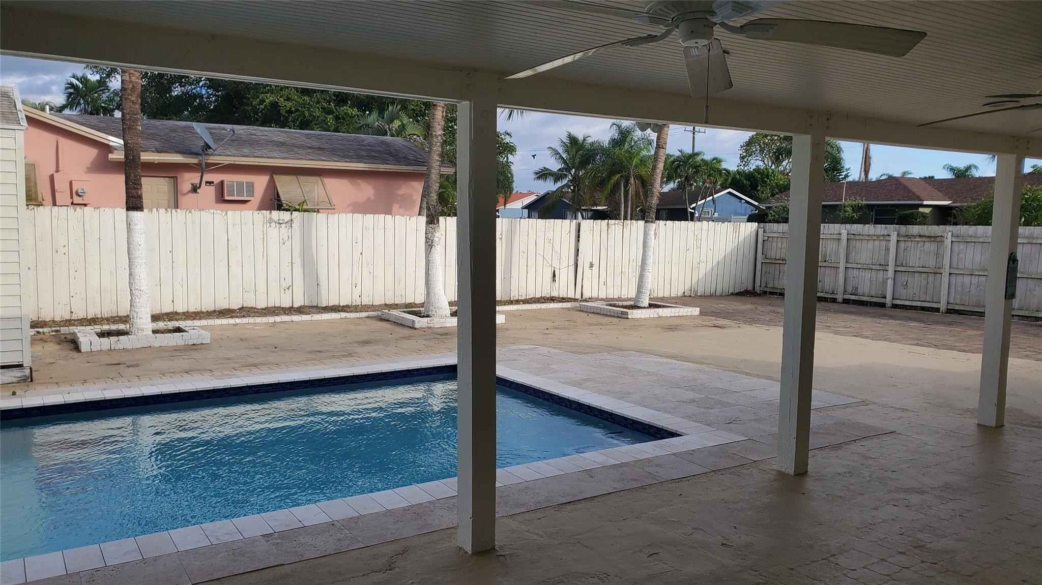 10734 Shady Pond Lane Boca Raton, FL 33428 - Photo 17 of 23 a view of a living room and window