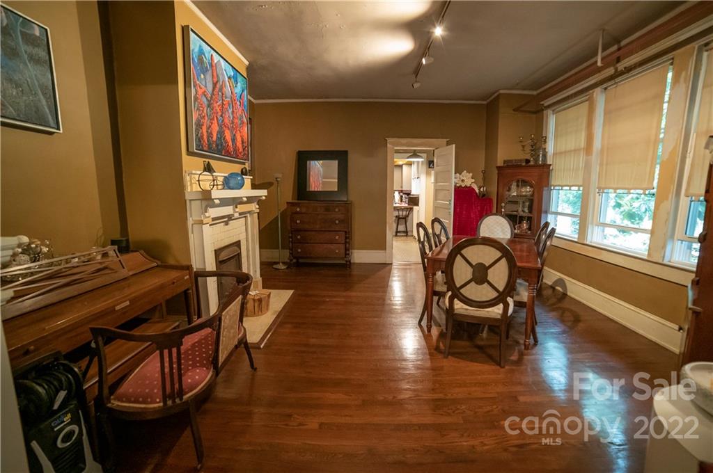 100 Morehead Street Morganton, NC 28655 - Photo 11 of 37 a dining room with furniture and wooden floor