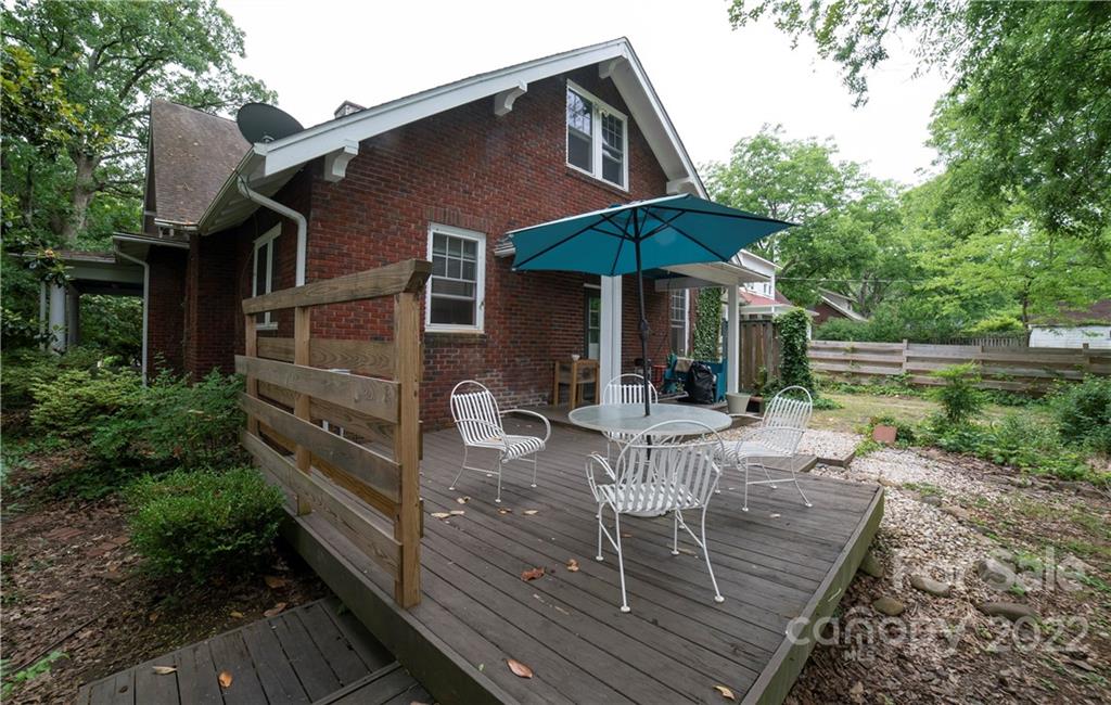100 Morehead Street Morganton, NC 28655 - Photo 32 of 37 a view of house with backyard and patio