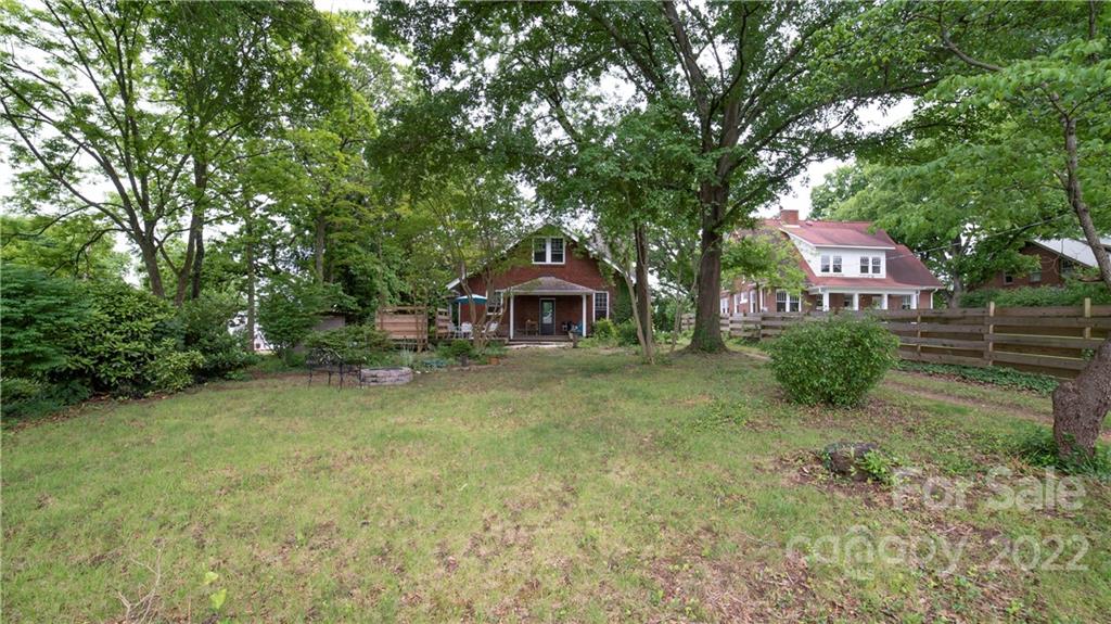 100 Morehead Street Morganton, NC 28655 - Photo 34 of 37 a front view of a house with garden