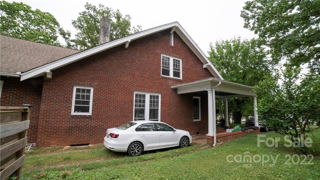 100 Morehead Street Morganton, NC 28655 - Photo 36 of 37 a car parked in front of house