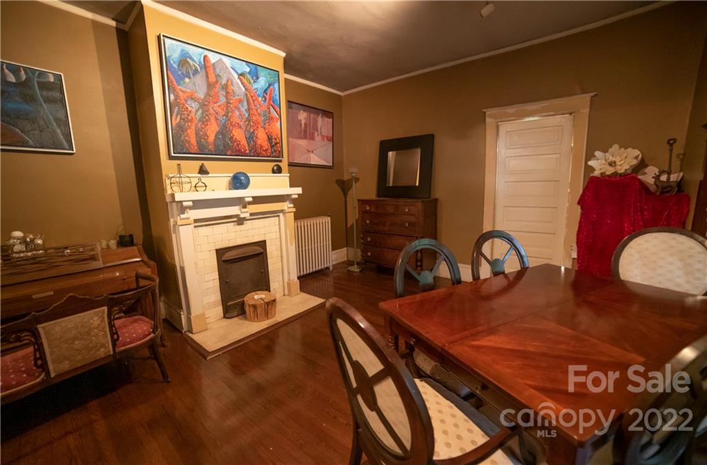 100 Morehead Street Morganton, NC 28655 - Photo 10 of 37 a kitchen with stainless steel appliances granite countertop a stove a sink and a refrigerator