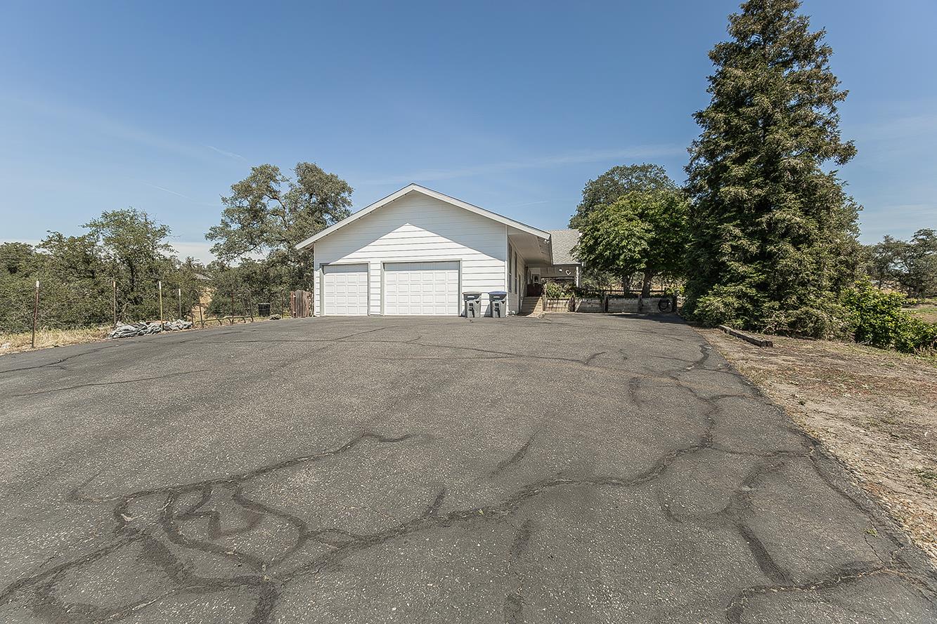 14815 Garlock Lane Prather, CA 93651 - Photo 64 of 80 a view of a house with a yard