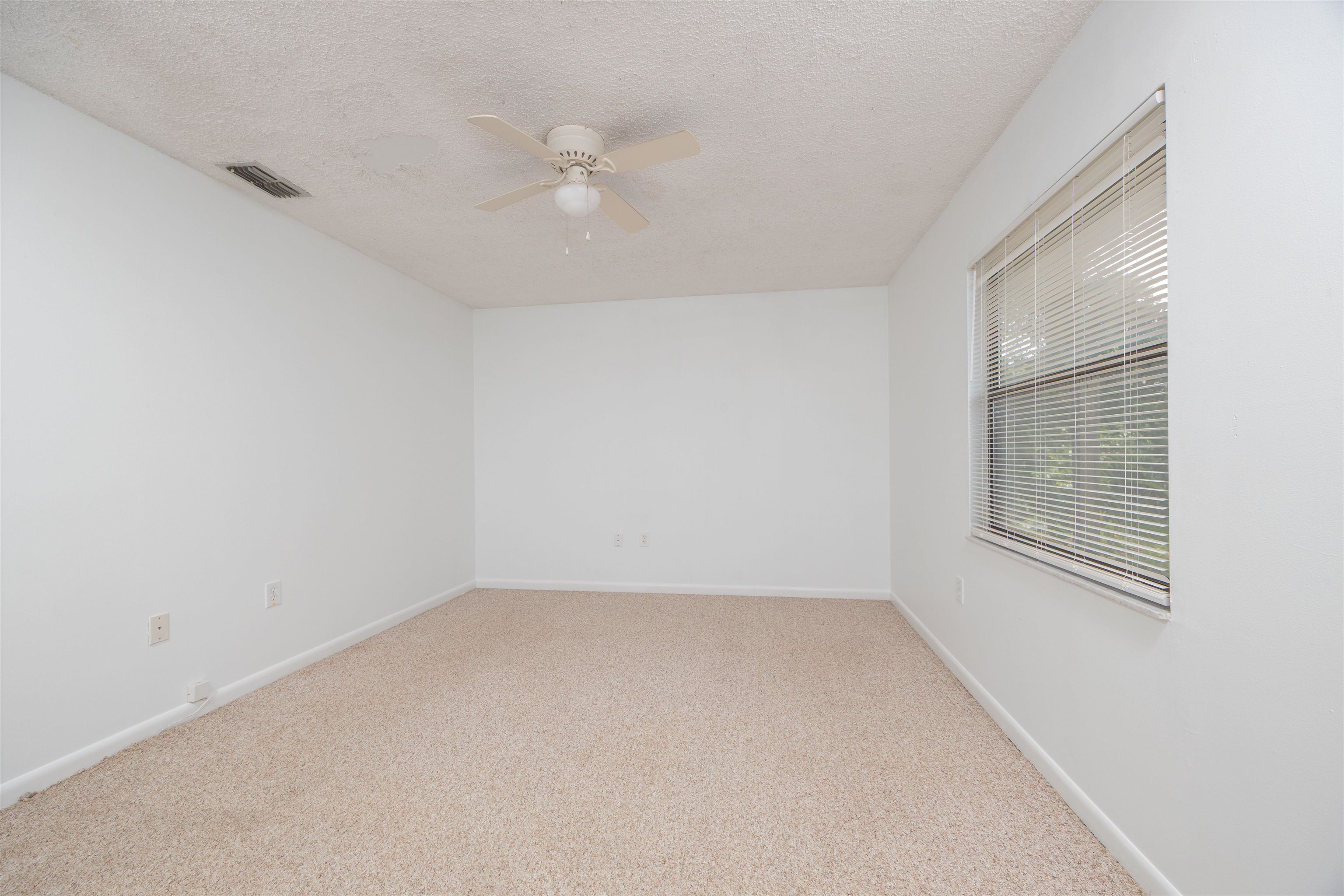 114 Lobelia Road St. Augustine, FL 32086 - Photo 15 of 38 an empty room with a window