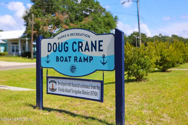 a sign on the side of a road