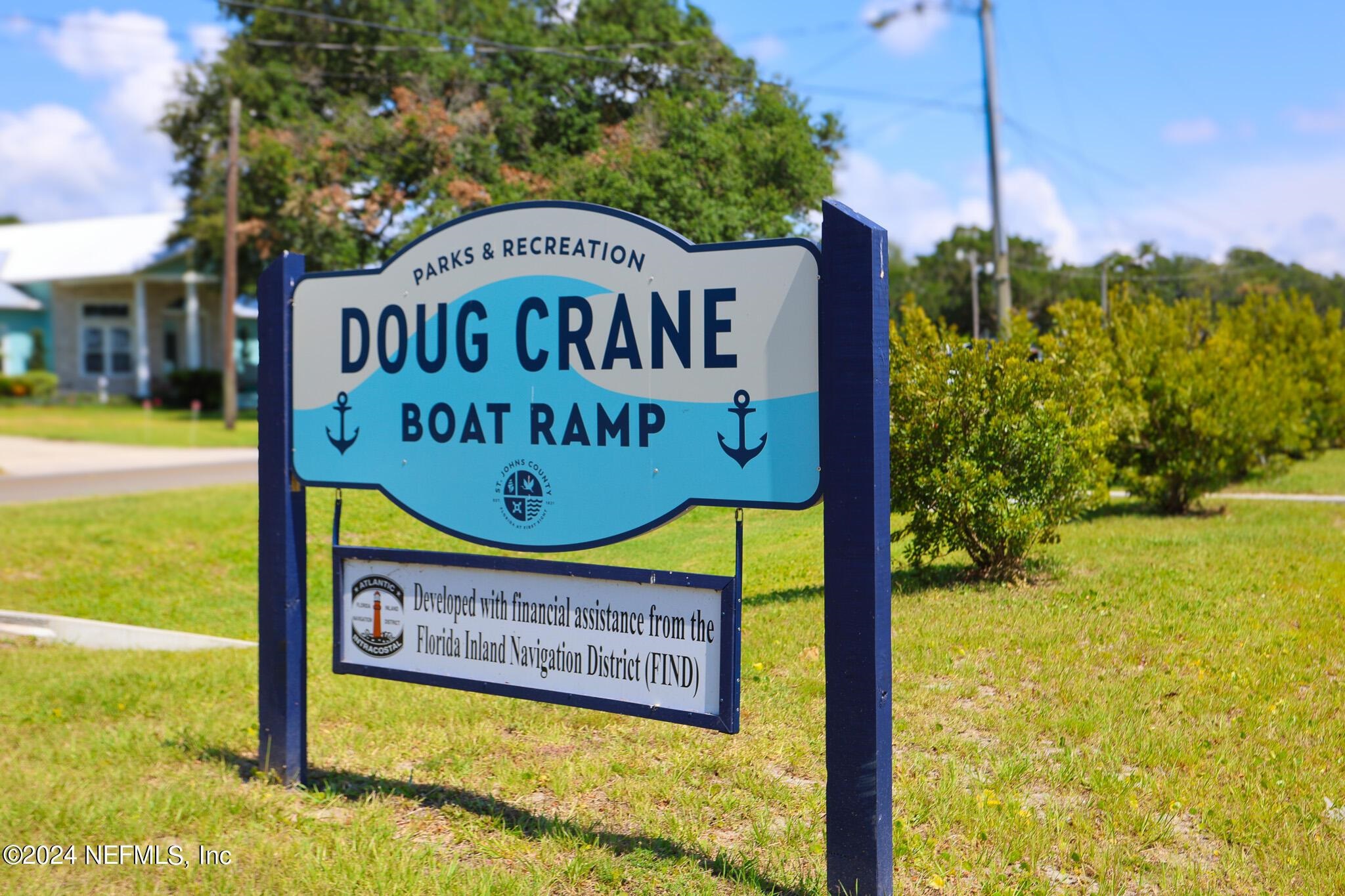 114 Lobelia Road St. Augustine, FL 32086 - Photo 25 of 38 a sign on the side of a road