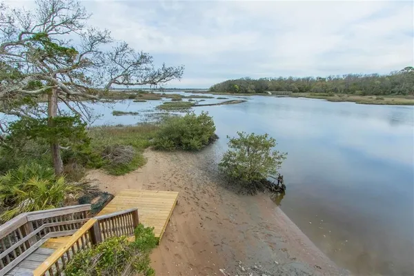 a view of lake with green space