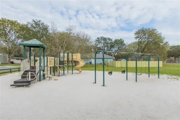 a view of a park with swings