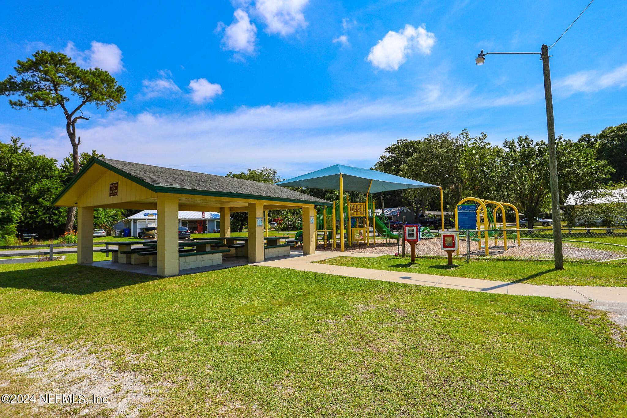 114 Lobelia Road St. Augustine, FL 32086 - Photo 35 of 38 a view of a house with a swimming pool