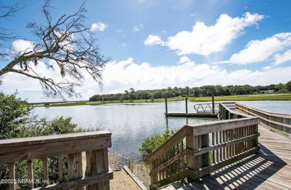 114 Lobelia Road St. Augustine, FL 32086 - Photo 37 of 38 a view of a lake with a mountain in the background