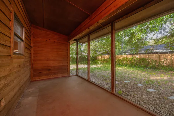 a view of a room with a large window
