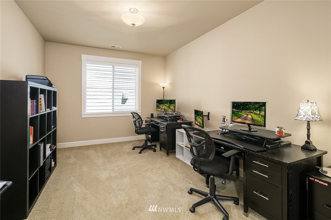 6308 Southeast 2nd Street Renton, WA 98059 - Photo 13 of 29 a view of a workspace with furniture and a window