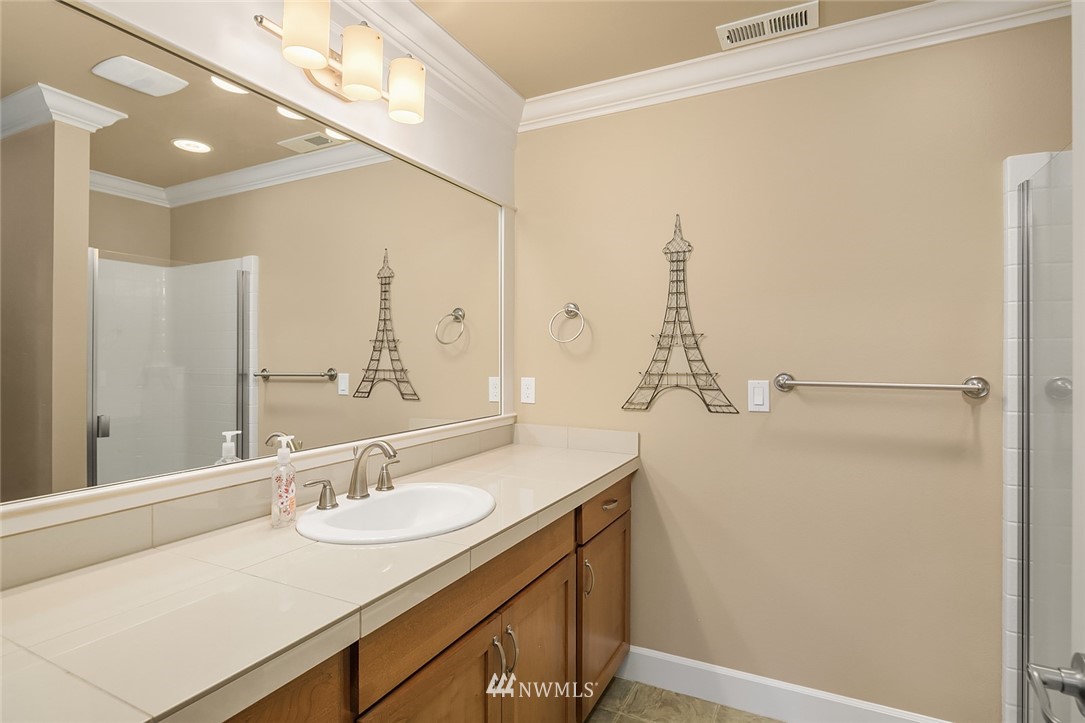 6308 Southeast 2nd Street Renton, WA 98059 - Photo 14 of 29 a bathroom with a sink and a mirror