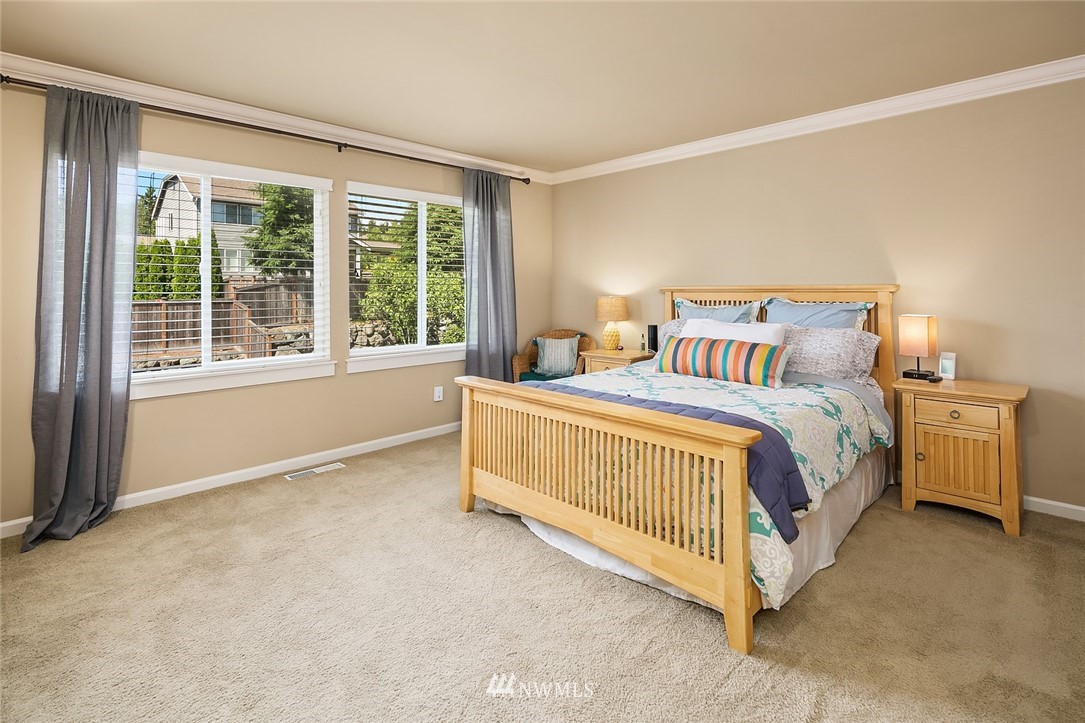 6308 Southeast 2nd Street Renton, WA 98059 - Photo 15 of 29 a bed sitting in a room next to a window