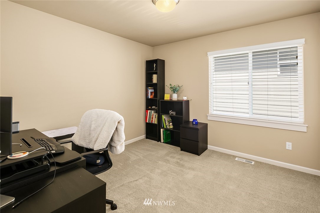 6308 Southeast 2nd Street Renton, WA 98059 - Photo 21 of 29 a room with furniture and a window