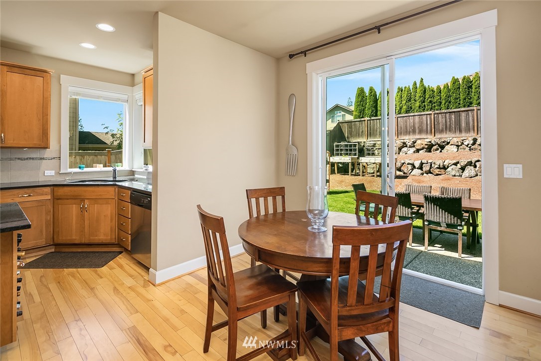 6308 Southeast 2nd Street Renton, WA 98059 - Photo 10 of 29 a dining room with furniture and a large window
