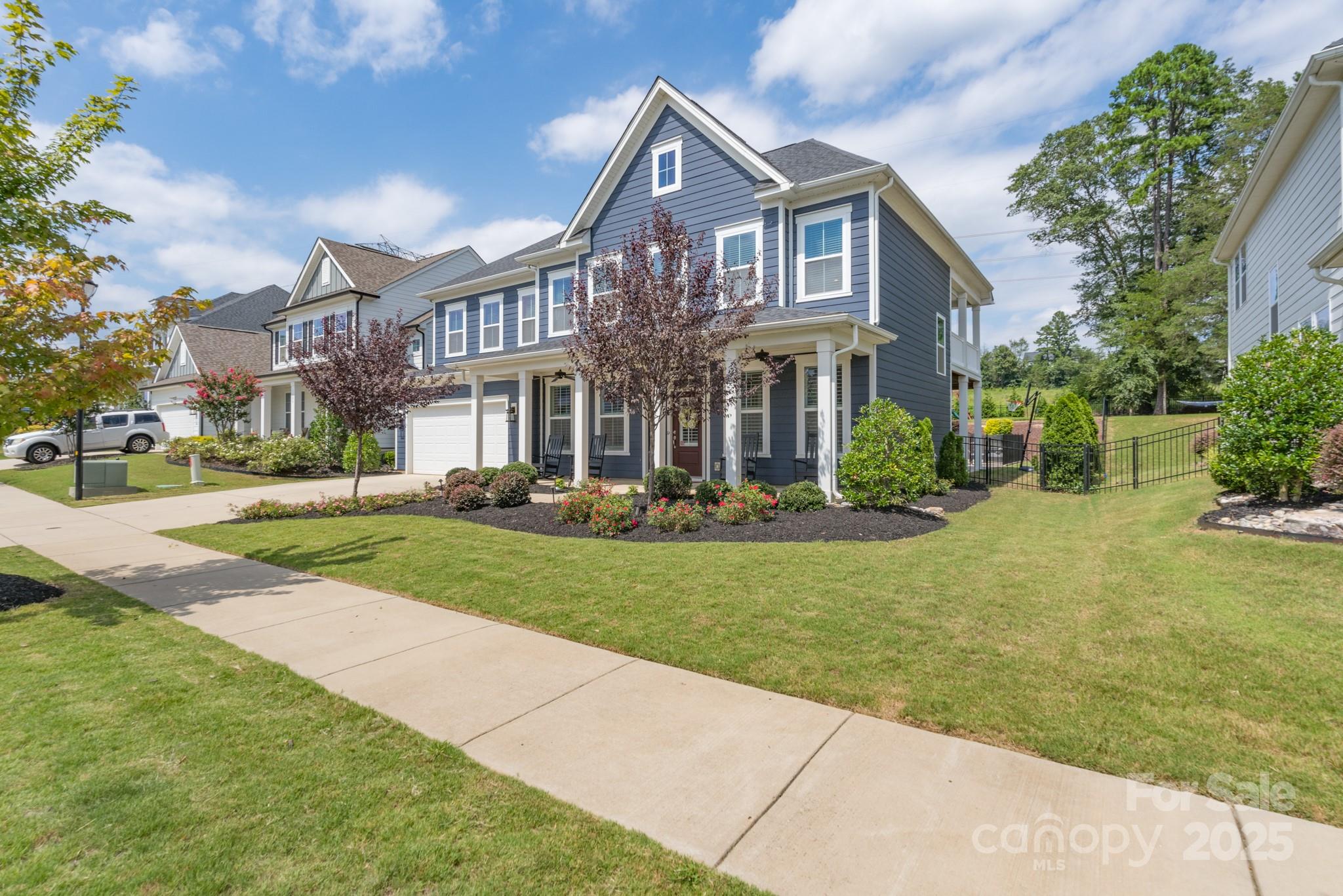 1180 Weir Court Fort Mill, SC 29708 - Photo 2 of 37 a front view of house with yard and green space