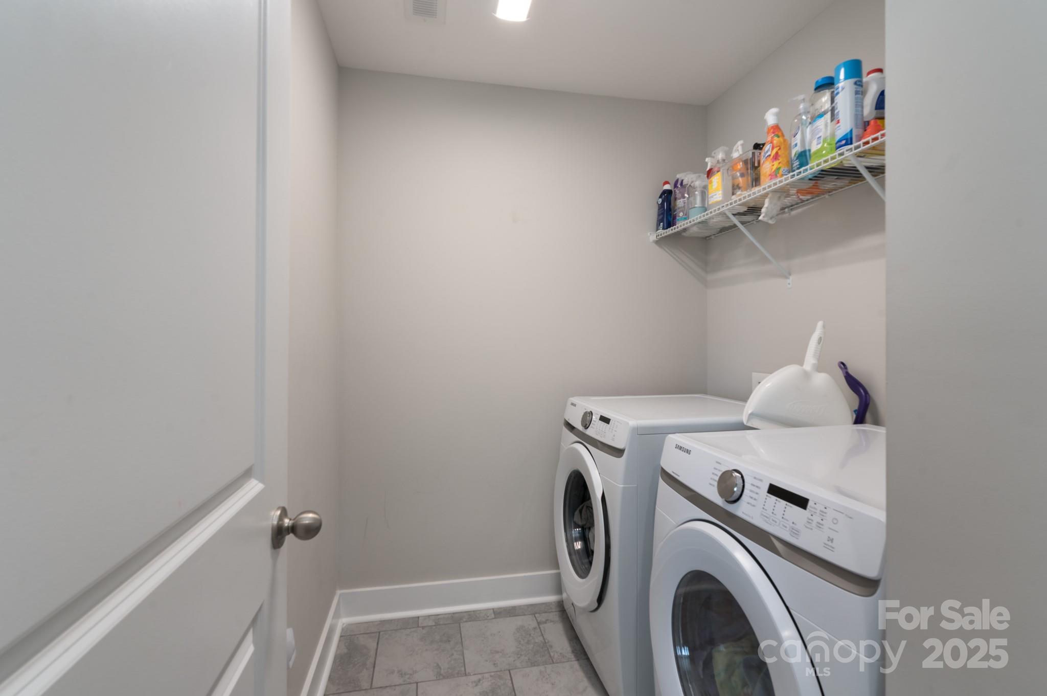 1180 Weir Court Fort Mill, SC 29708 - Photo 27 of 37 a utility room with dryer and washer